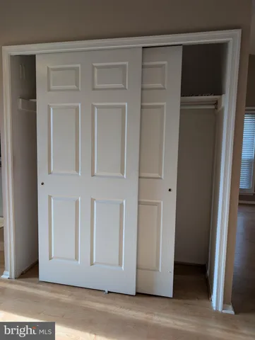 a view of a livingroom with wooden floor