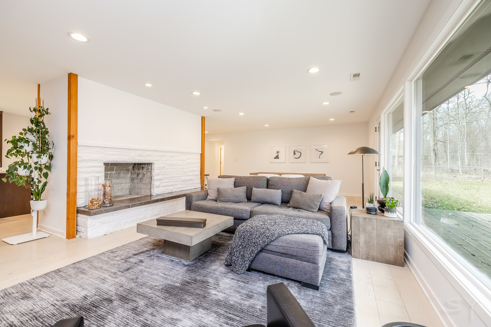 3060 Orange Brace Road Riverwoods, IL 60015 - Photo 12 of 36 a living room with furniture and a fireplace