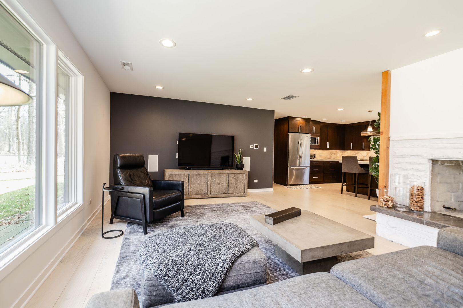 3060 Orange Brace Road Riverwoods, IL 60015 - Photo 15 of 36 a living room with furniture and a flat screen tv