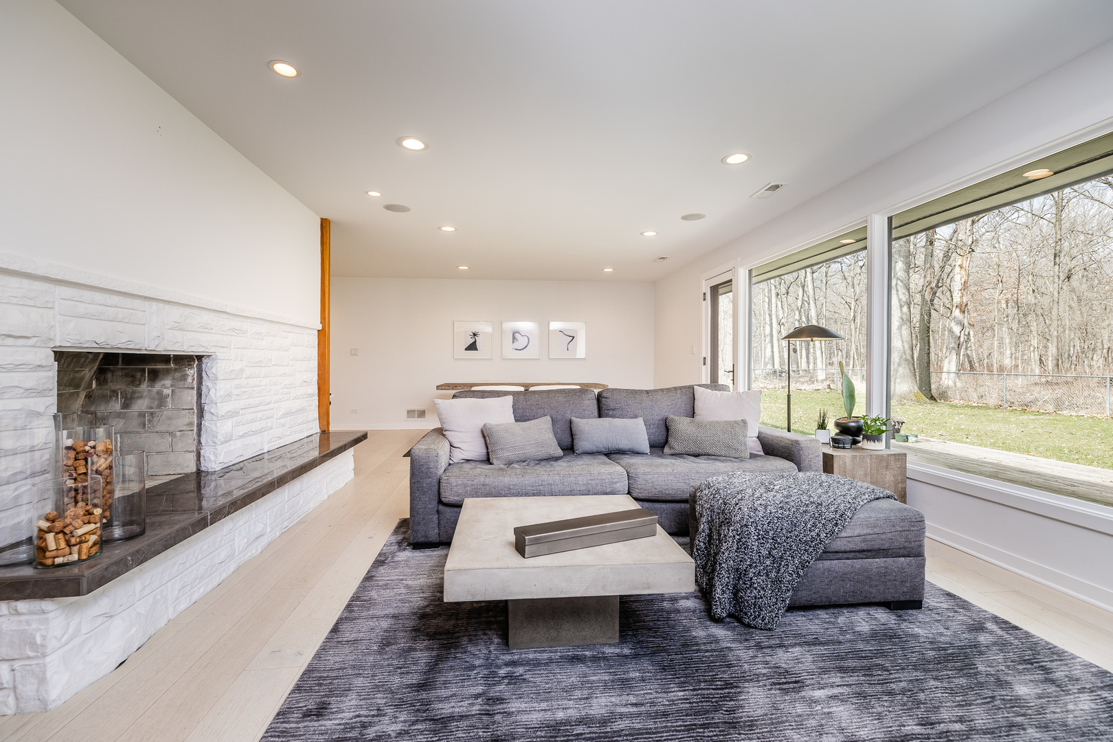 3060 Orange Brace Road Riverwoods, IL 60015 - Photo 17 of 36 a living room with furniture flat screen tv and a large window