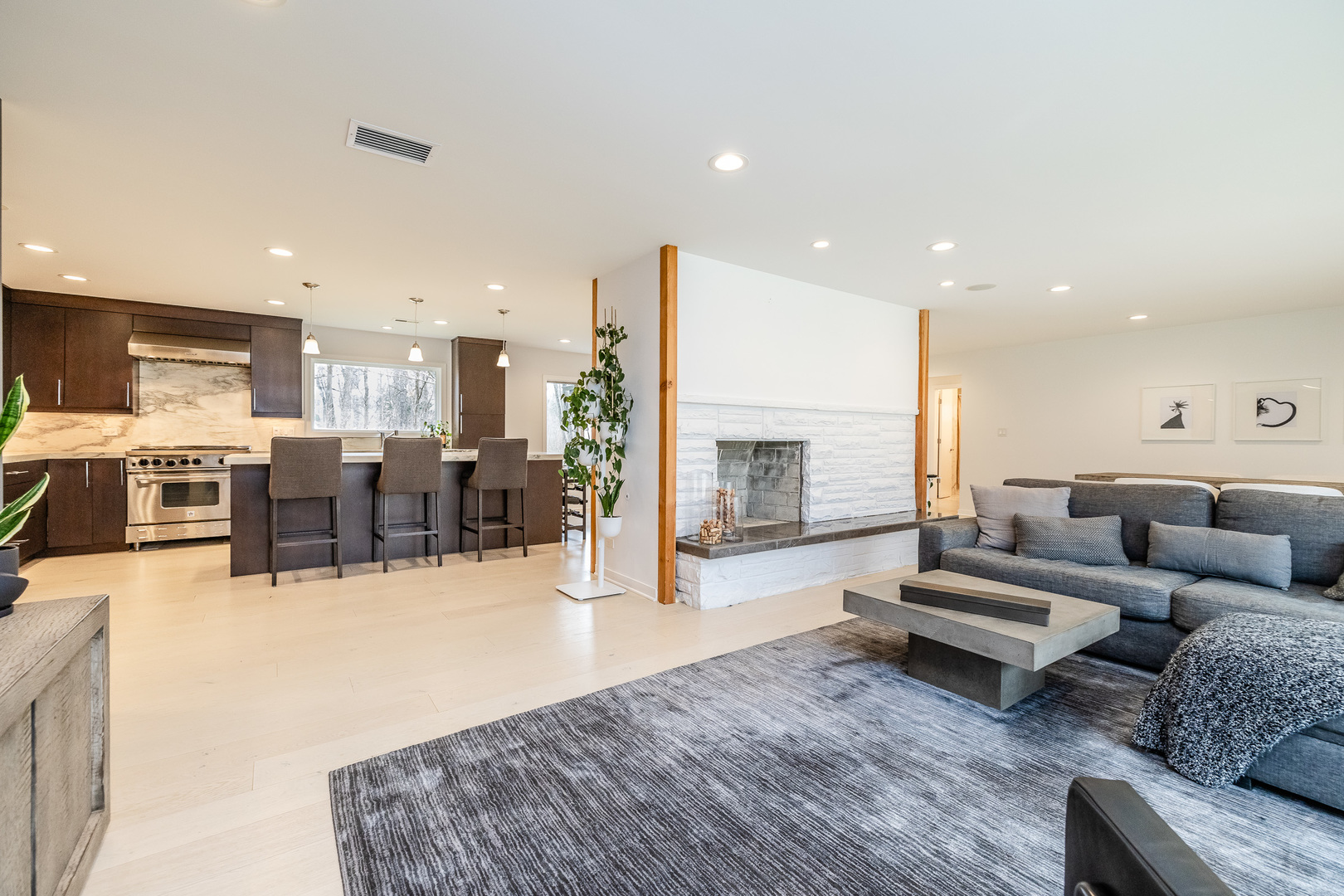 3060 Orange Brace Road Riverwoods, IL 60015 - Photo 18 of 36 a living room with furniture and kitchen view