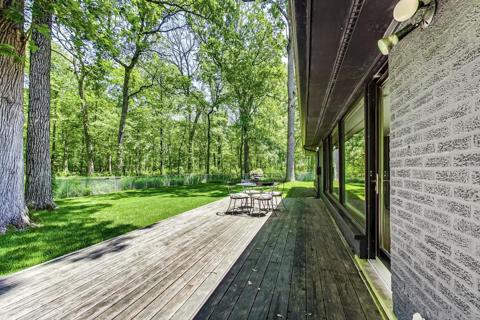 3060 Orange Brace Road Riverwoods, IL 60015 - Photo 32 of 36 a view of a patio with a yard