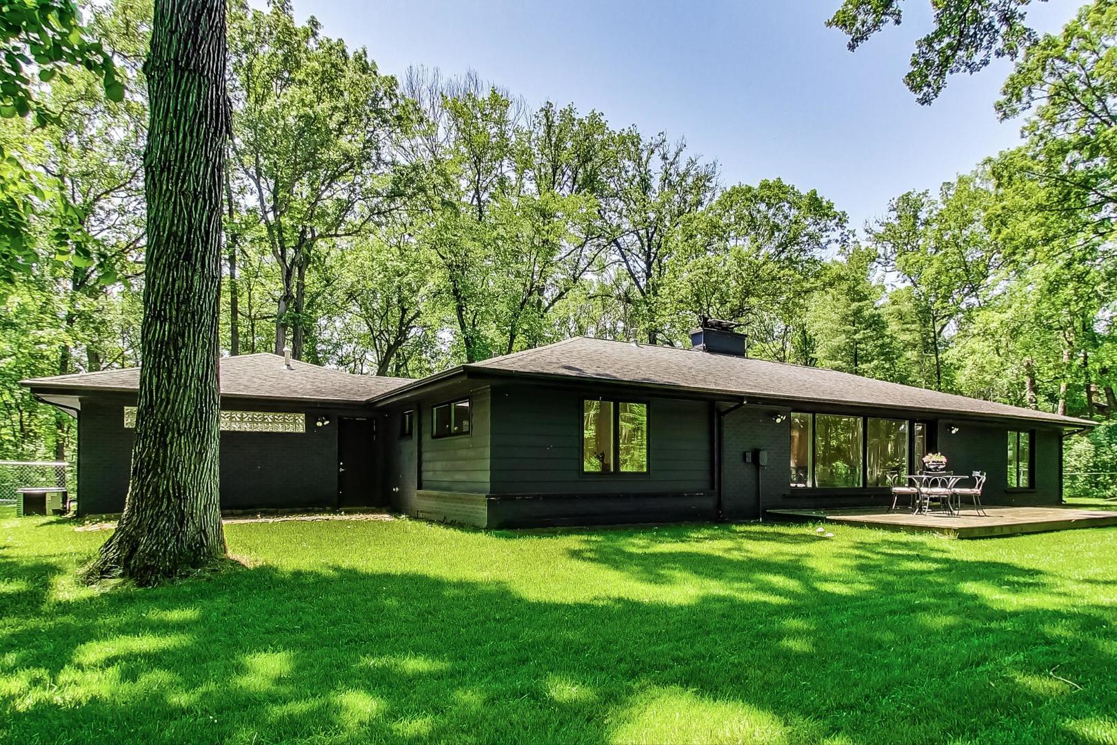 3060 Orange Brace Road Riverwoods, IL 60015 - Photo 33 of 36 a front view of a house with a yard