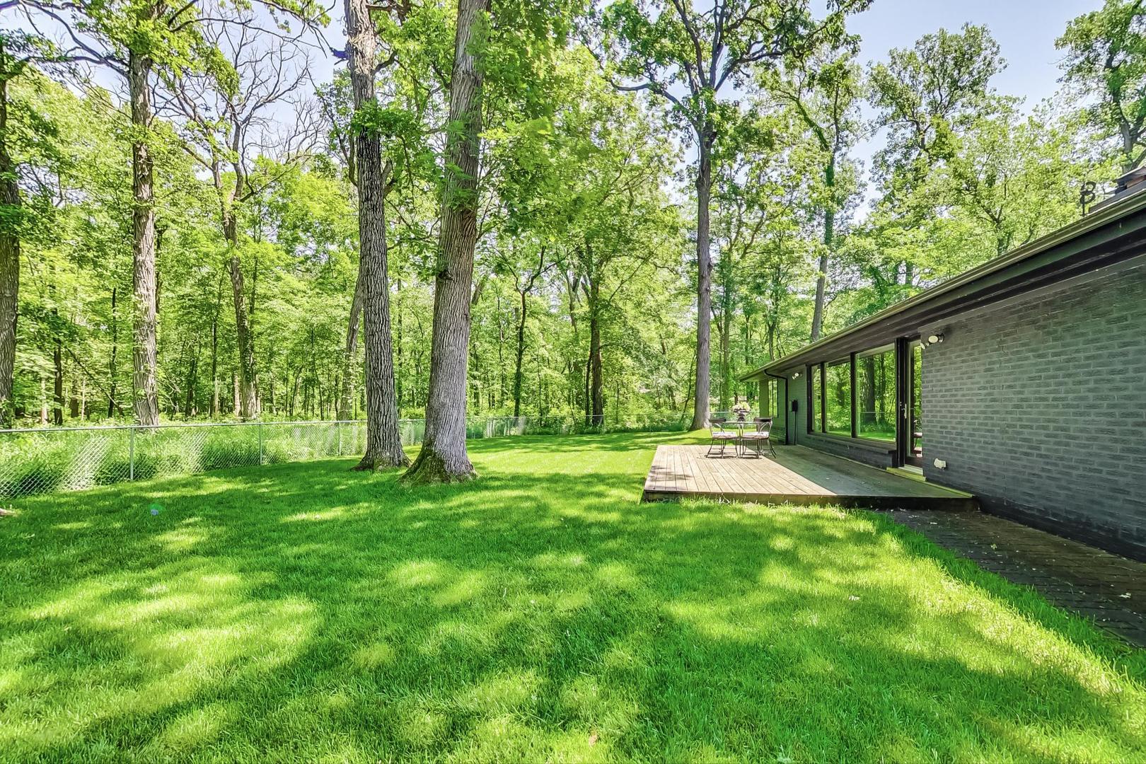3060 Orange Brace Road Riverwoods, IL 60015 - Photo 34 of 36 a view of a backyard with large trees