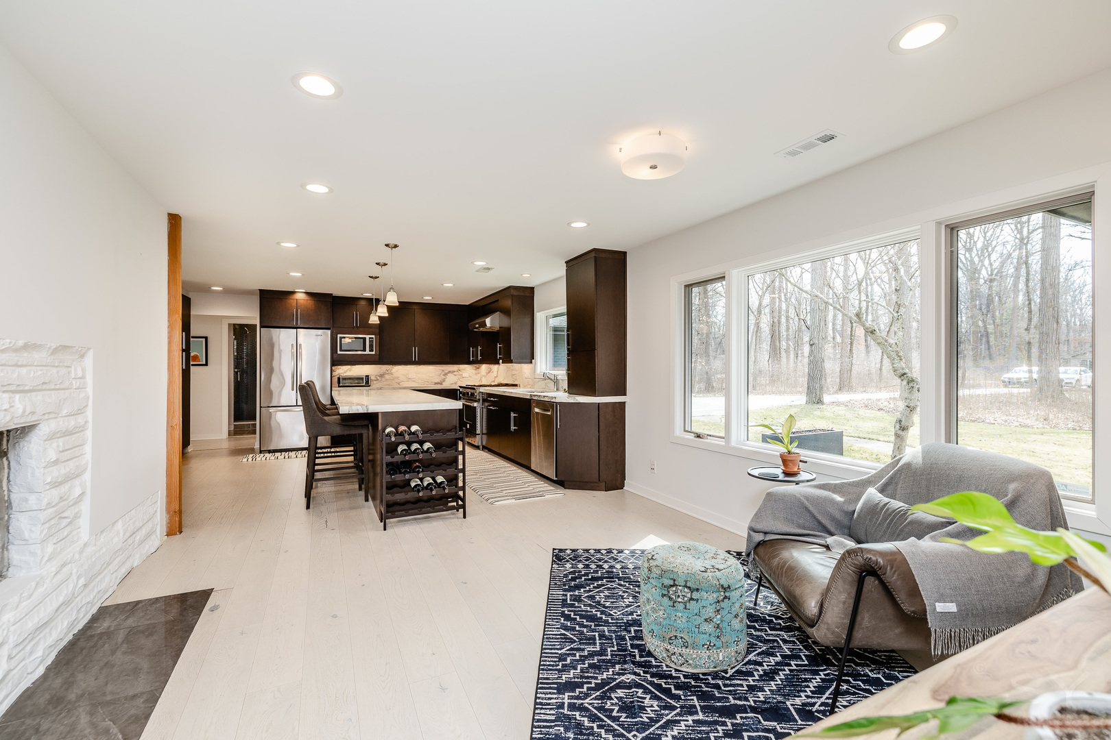 3060 Orange Brace Road Riverwoods, IL 60015 - Photo 6 of 36 a living room with furniture and a large window