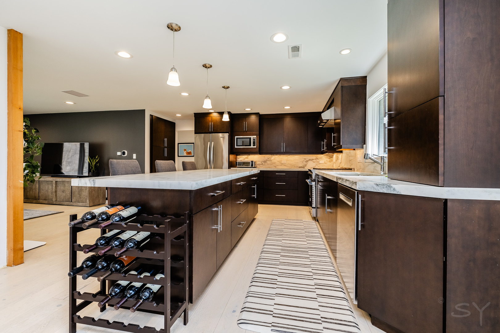 3060 Orange Brace Road Riverwoods, IL 60015 - Photo 8 of 36 a large kitchen with stainless steel appliances kitchen island granite countertop a sink and cabinets
