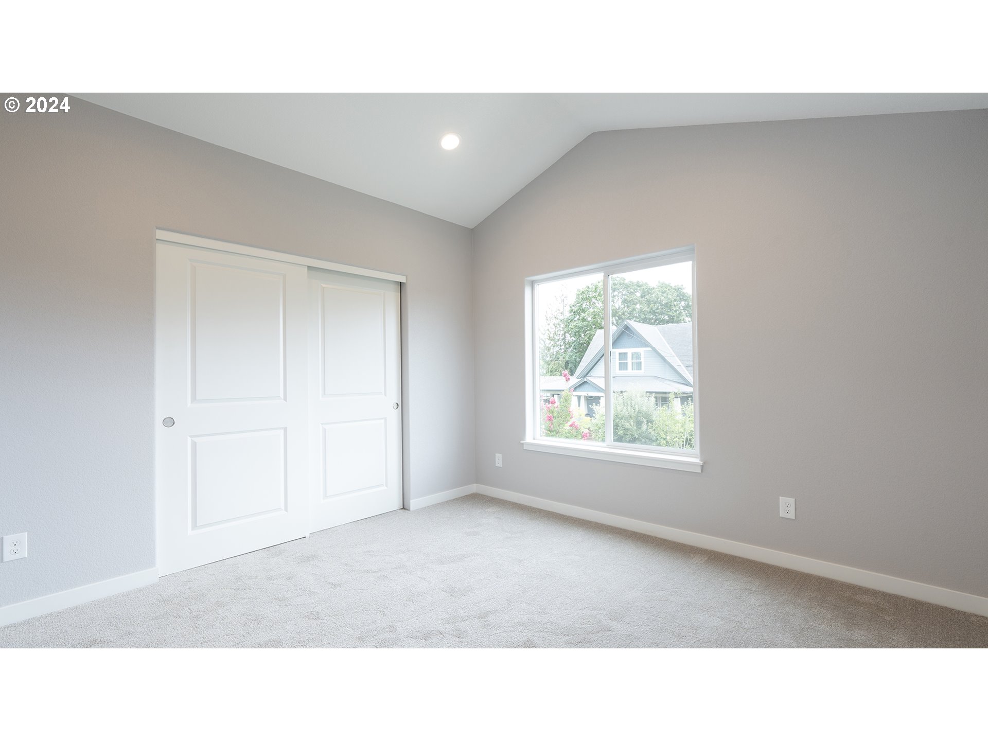 6921 Southeast Pardee Street, Unit A Portland, OR 97206 - Photo 11 of 16 a open hall with a window