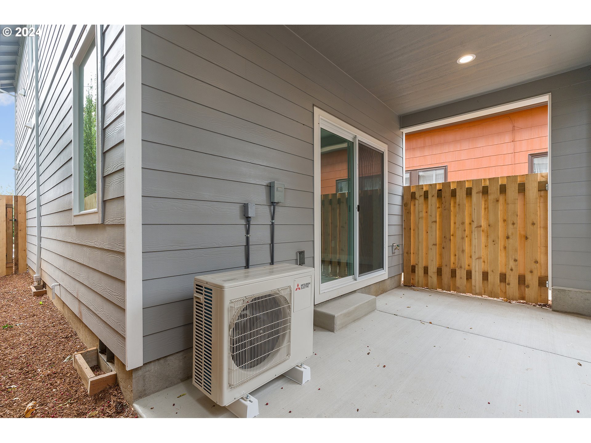 6921 Southeast Pardee Street, Unit A Portland, OR 97206 - Photo 16 of 16 a view of outdoor space and front view of a house