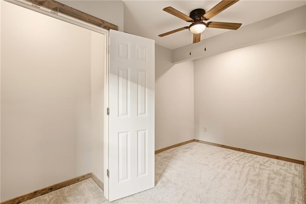 1311 Main Street Berlin, PA 15530 - Photo 14 of 36 an empty room with a window and a fan