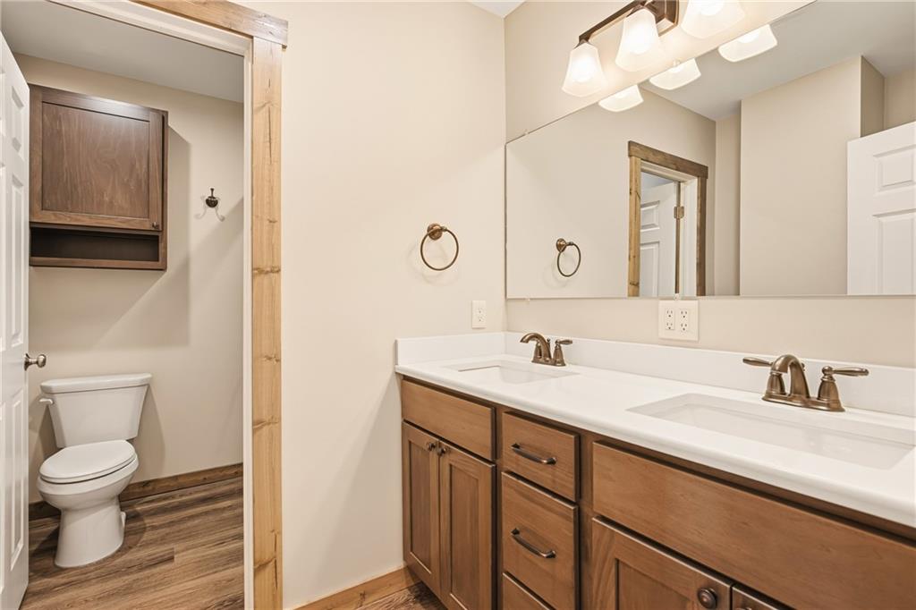 1311 Main Street Berlin, PA 15530 - Photo 16 of 36 a bathroom with a toilet a sink and a mirror