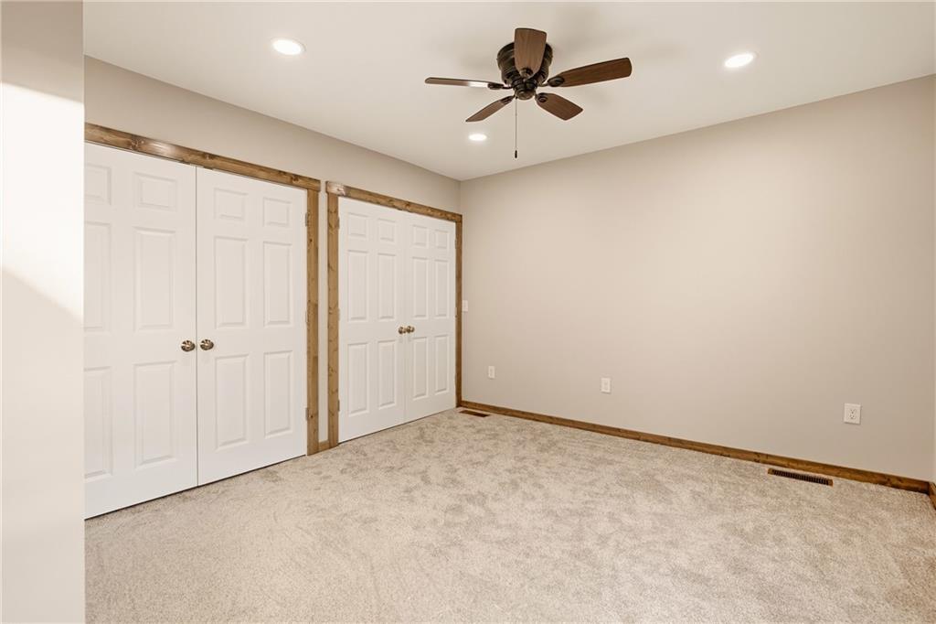 1311 Main Street Berlin, PA 15530 - Photo 19 of 36 an empty room with a ceiling fan and a window