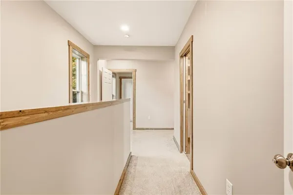 a view of hallway with livingroom