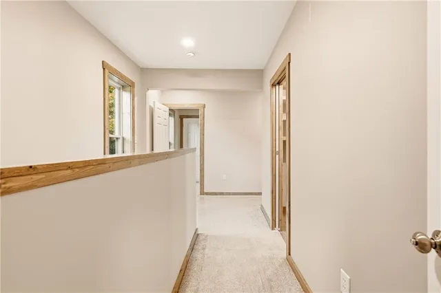 a view of hallway with livingroom