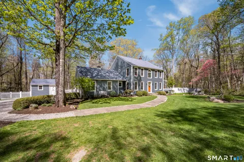 a kitchen with stainless steel appliances granite countertop lots of counter top and sink