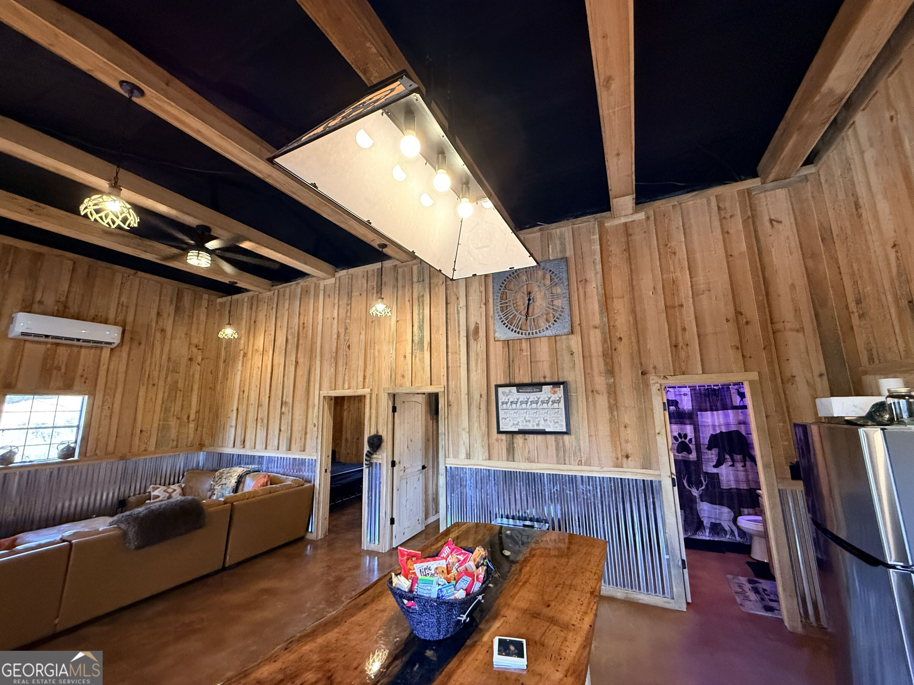 301 Beaver Dam Road Toomsboro, GA 31090 - Photo 13 of 99 a bedroom with furniture and a window