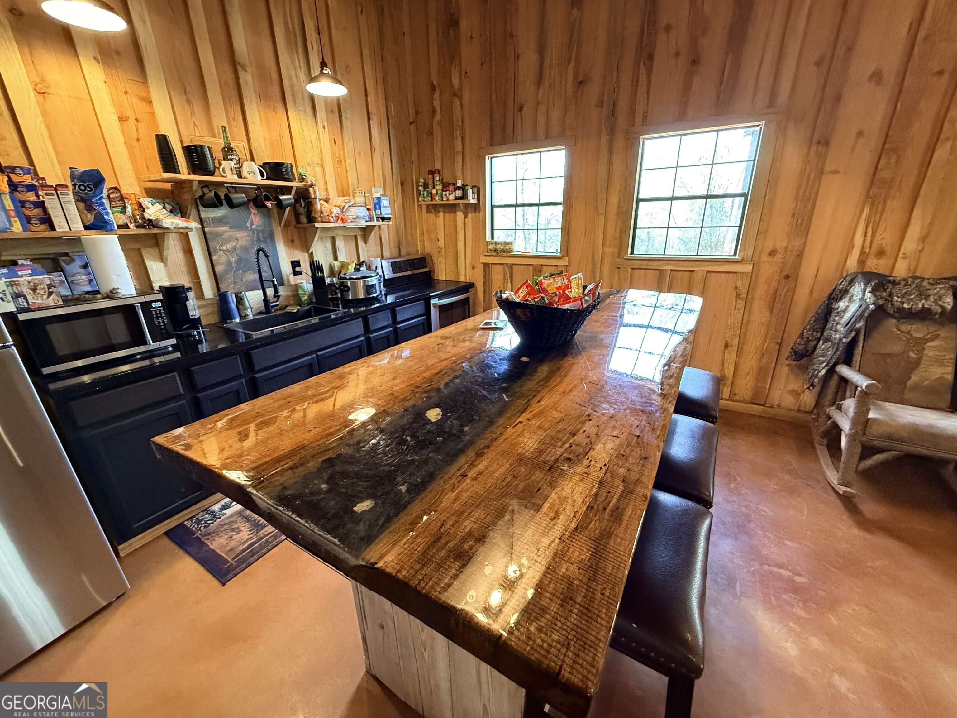 301 Beaver Dam Road Toomsboro, GA 31090 - Photo 17 of 99 a view of a living room and dining room