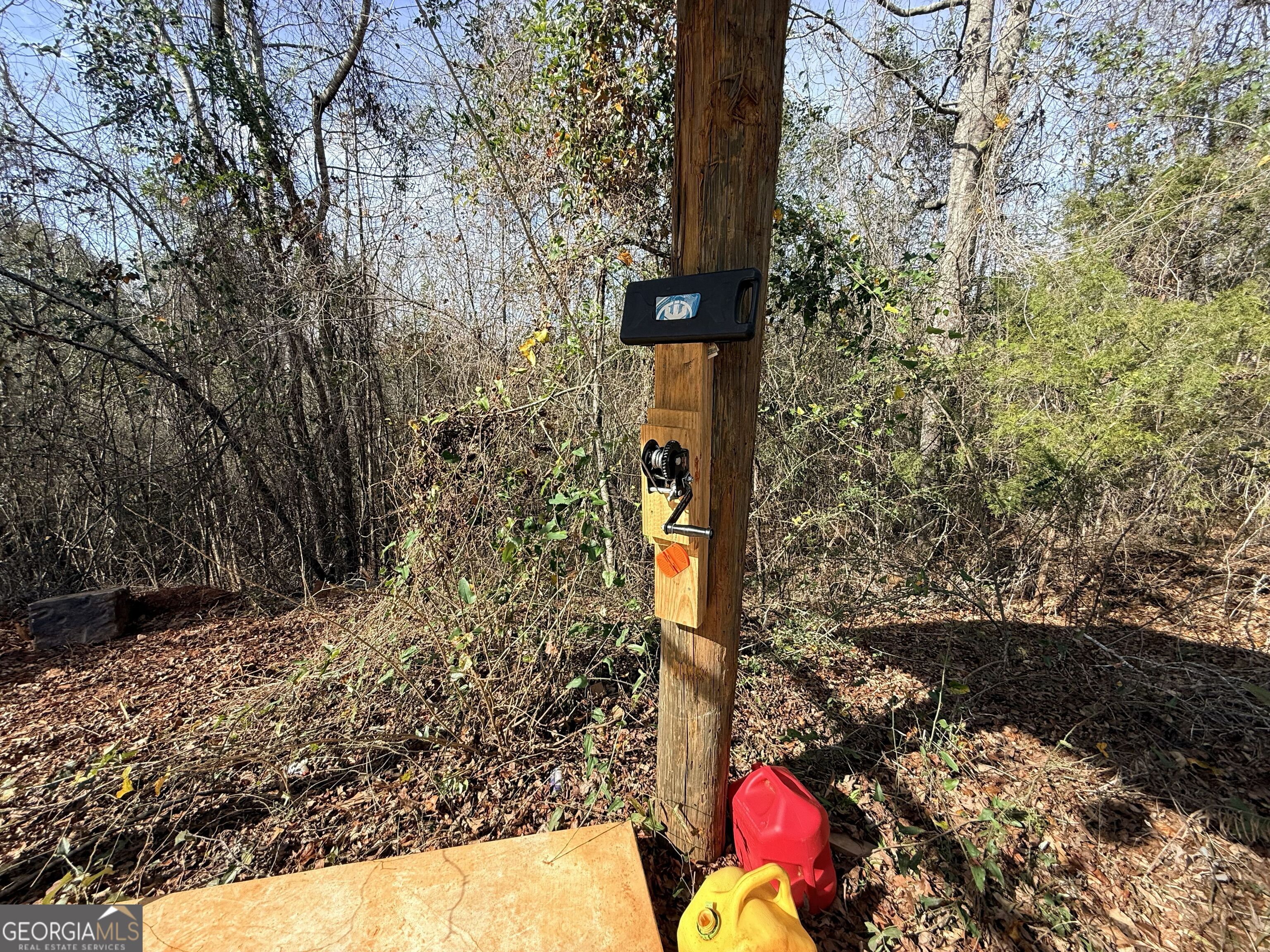 301 Beaver Dam Road Toomsboro, GA 31090 - Photo 59 of 99 a street sign that is on a tree