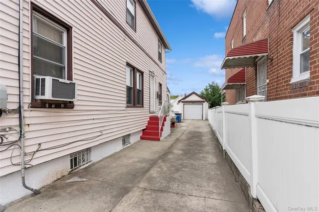 a view of a house with a street