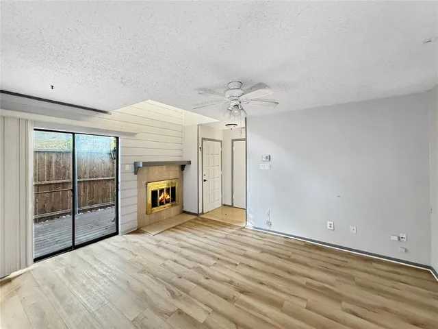 a view of a livingroom with a fireplace