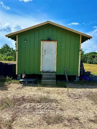 a view of swimming pool with a bench