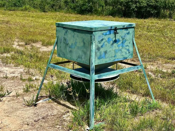a stone house with a yard