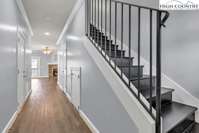 a view of gallery with wooden floor