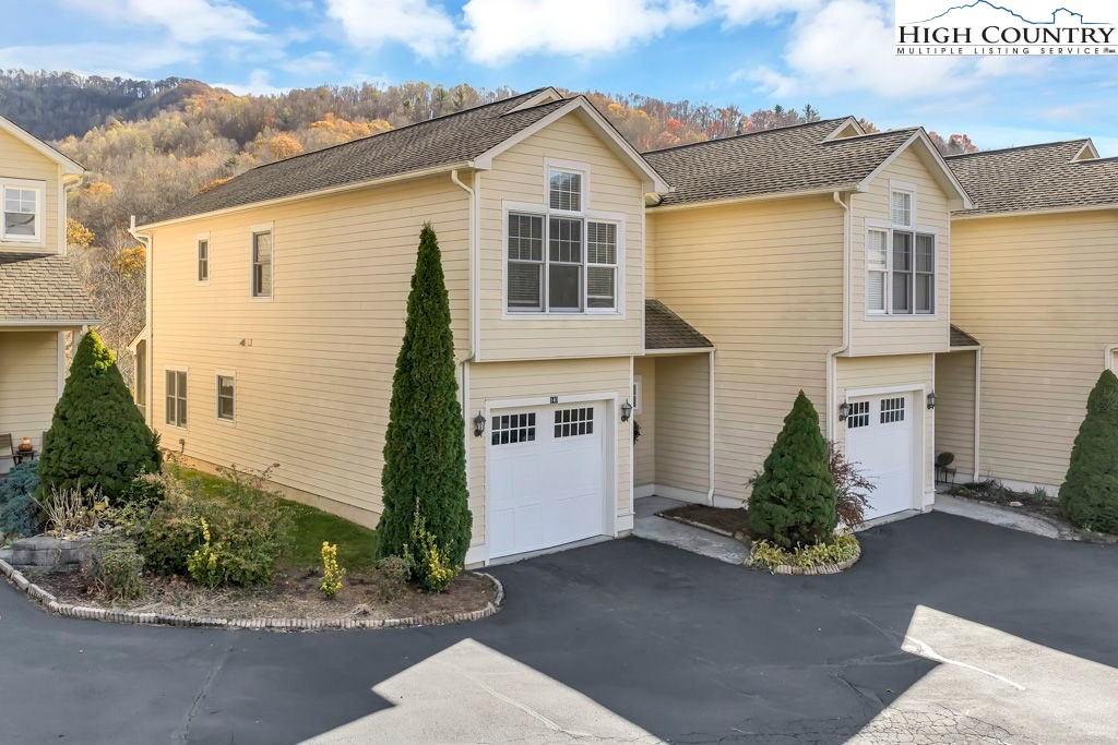 140 Silo Ridge Lane, Unit 140 Vilas, NC 28692 - Photo 27 of 27 a front view of a house with garden