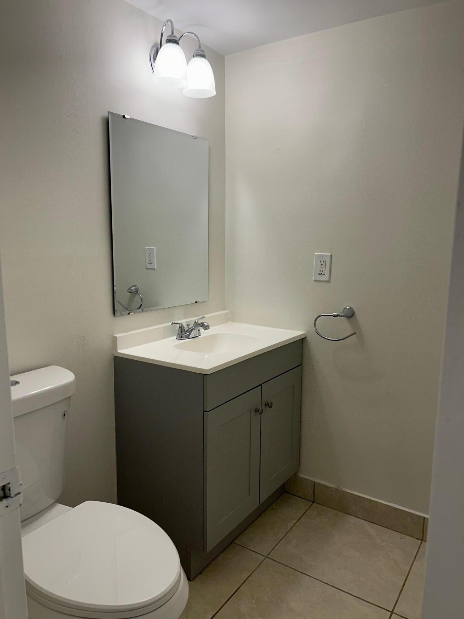 620 Northwest 13th Street, Unit 15 Boca Raton, FL 33486 - Photo 8 of 29 "Half Bath"