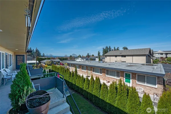 a balcony with outdoor view