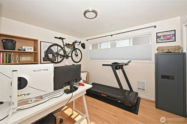 a view of a room with gym equipment
