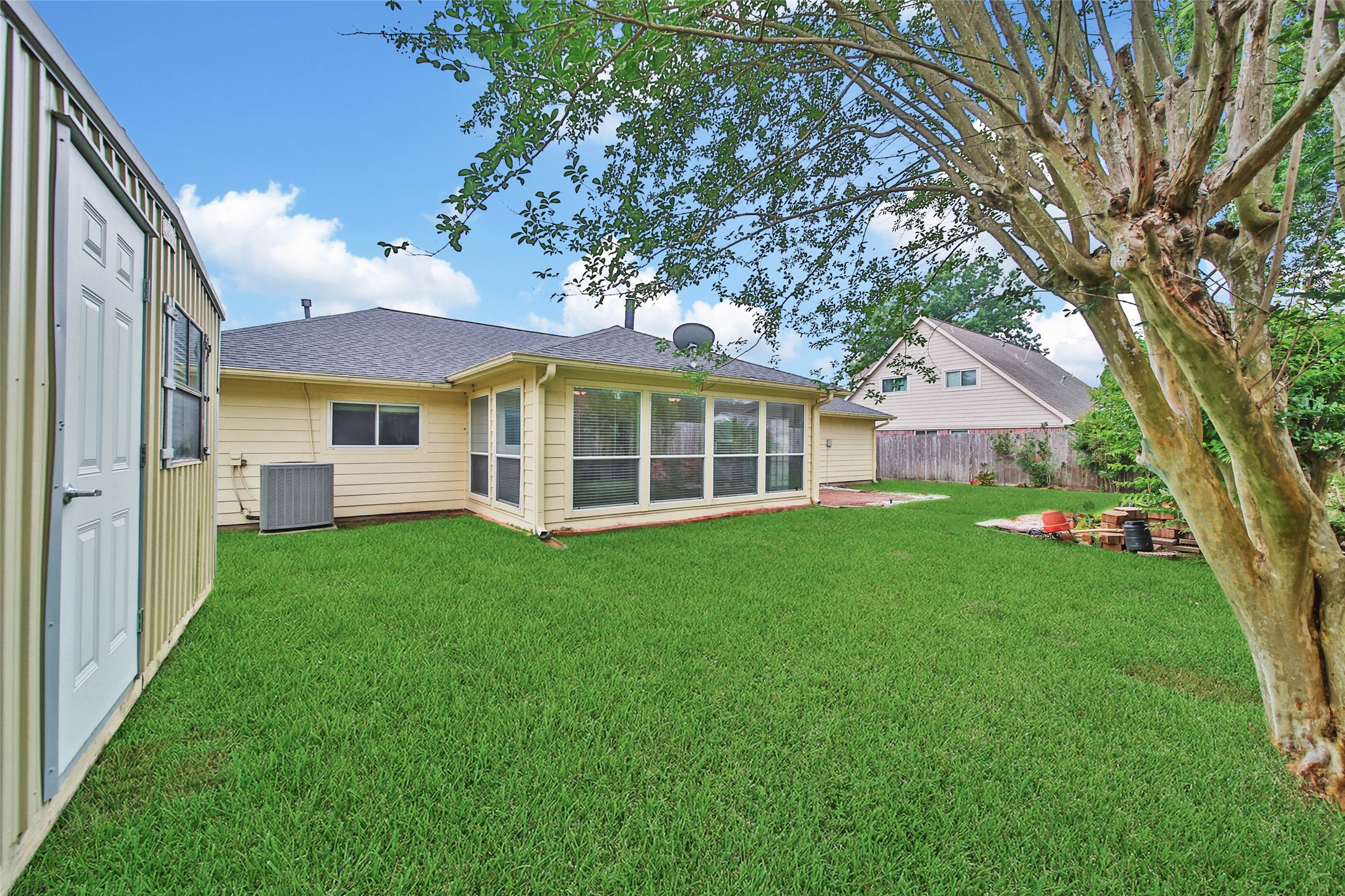 5010 Cupids Bower Court Spring, TX 77388 - Photo 33 of 40 a view of a house with a backyard