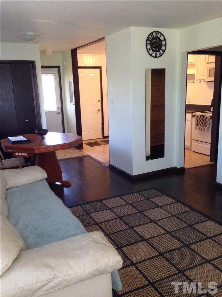 1144 Brighton Road Raleigh, NC 27610 - Photo 7 of 24 a room with a table and a window
