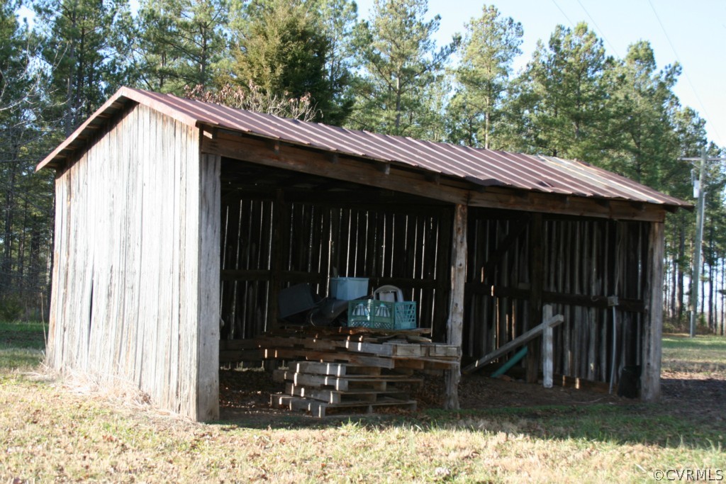 1970 Turkey Island Road Crewe, VA 23930 - Photo 14 of 15 a view of a house with yard and wooden fence