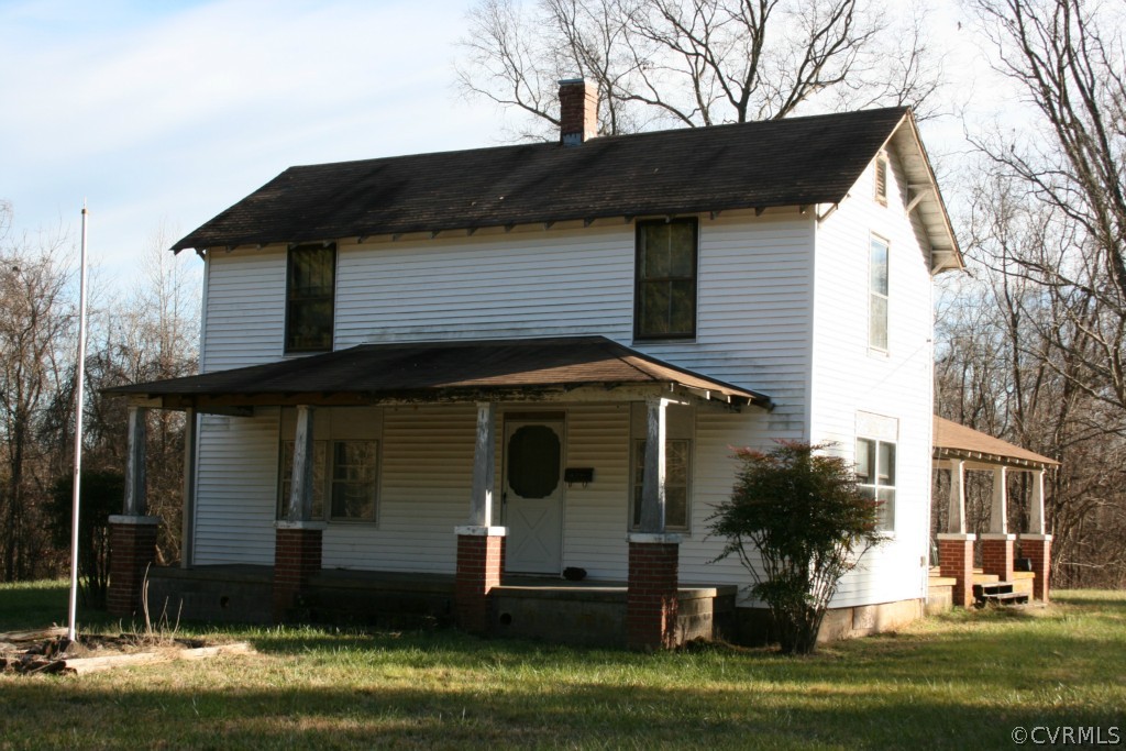 1970 Turkey Island Road Crewe, VA 23930 - Photo 3 of 15 a front view of a house with a yard and garage