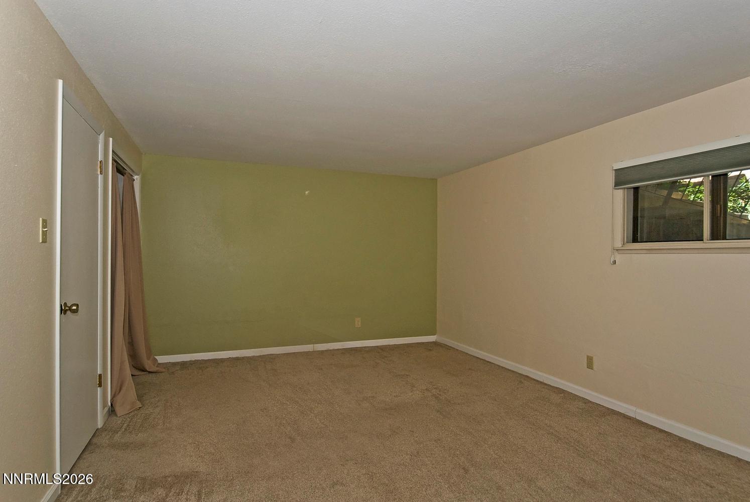 3185 Corey Drive Reno, NV 89509 - Photo 35 of 46 058-047-Downstairs Bedroom 4-1494x1000