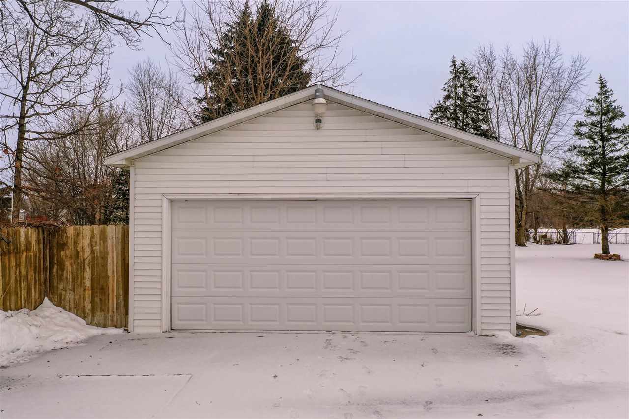 6021 Duffield Road Swartz Creek, MI 48473 - Photo 6 of 46 Garage Has Workbenches