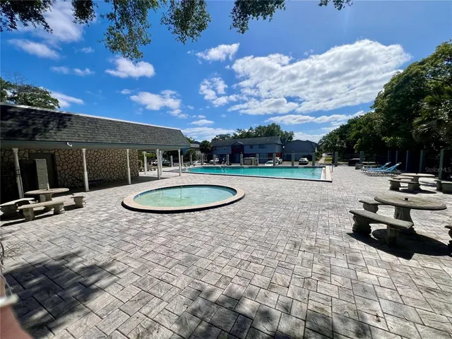 a view of outdoor space with swimming pool