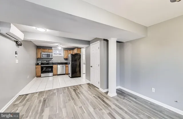 a view of kitchen with wooden floor