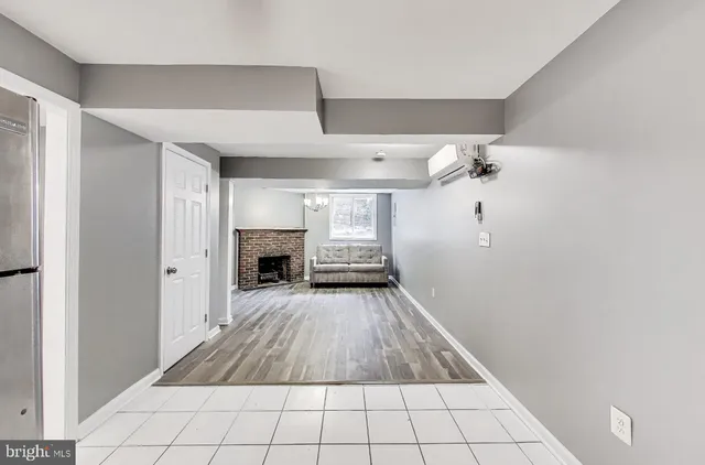 a view of a livingroom with a fireplace