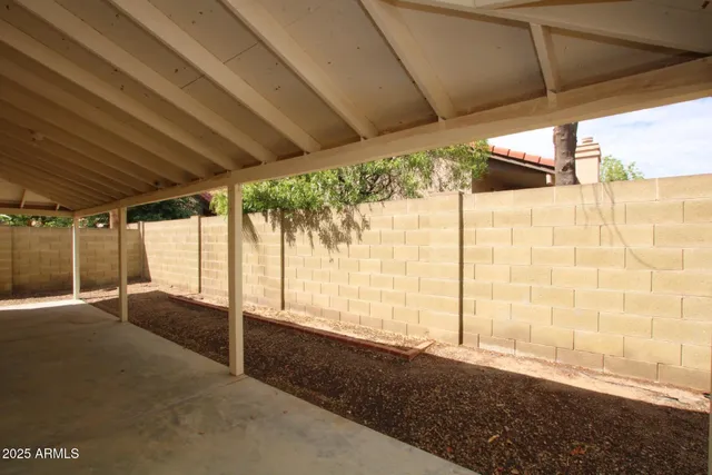 a view of an empty room with a sliding door