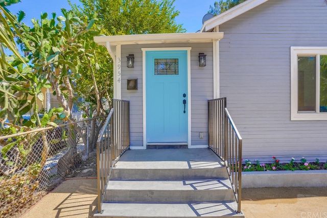 a front view of a house with a porch