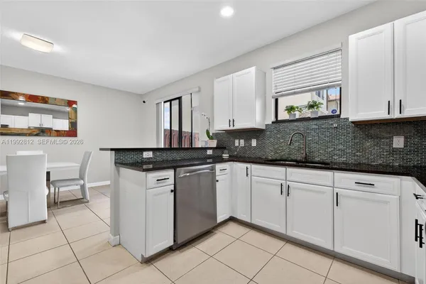 $659,000 | 9807 Northwest 88th Terrace, Doral, FL 33178