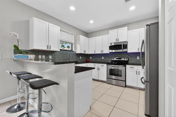 $659,000 | 9807 Northwest 88th Terrace, Doral, FL 33178