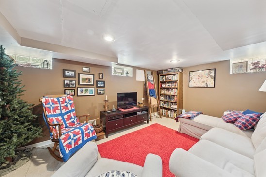 1220 South Fairview Avenue Park Ridge, IL 60068 - Photo 13 of 19 a living room with furniture workspace and a flat screen tv