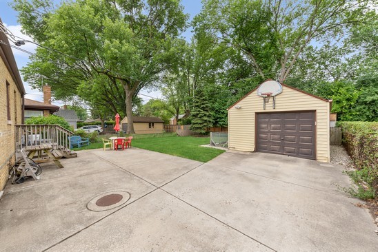 1220 South Fairview Avenue Park Ridge, IL 60068 - Photo 15 of 19 a front view of a house with garden