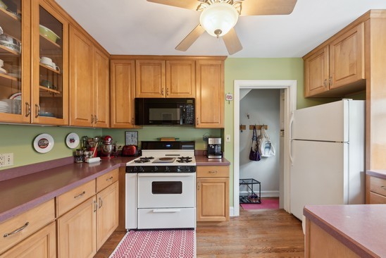 1220 South Fairview Avenue Park Ridge, IL 60068 - Photo 5 of 19 a kitchen with stainless steel appliances granite countertop a refrigerator a stove top oven a sink and dishwasher
