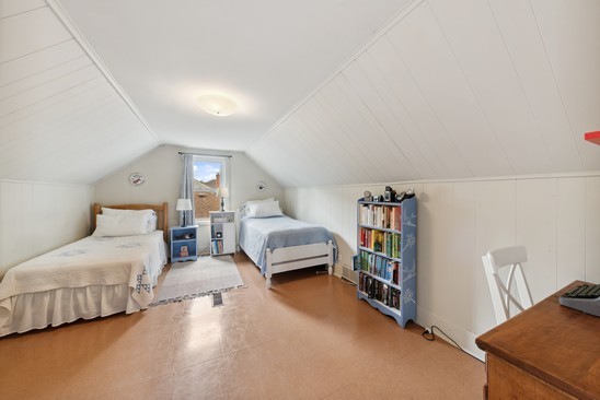 1220 South Fairview Avenue Park Ridge, IL 60068 - Photo 10 of 19 a bedroom with furniture and a book shelf