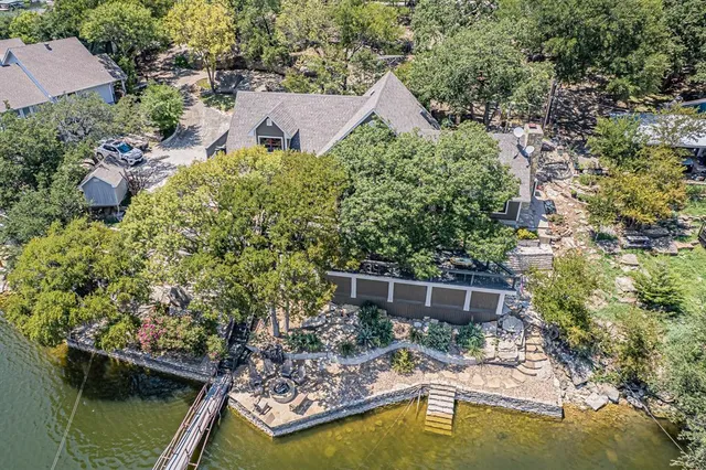 a view of house with swimming pool