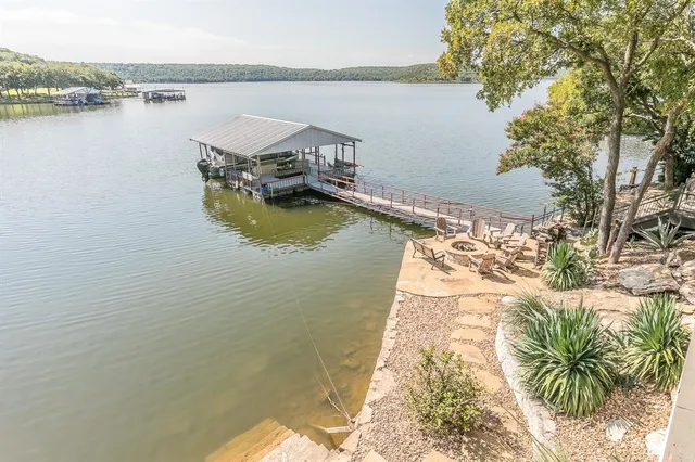 a view of a balcony next to a lake view