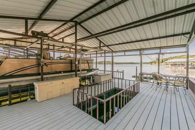 a view of porch with wooden floor